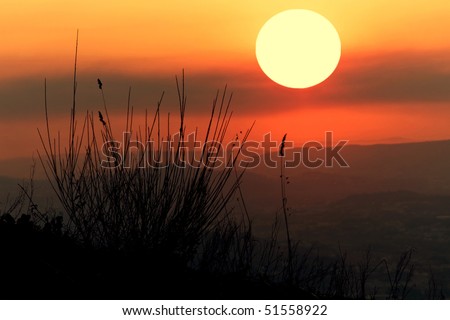 Beautiful sunset in the top of a mountain with colorful twilight sky