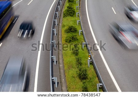 Highway with lots of car in motion