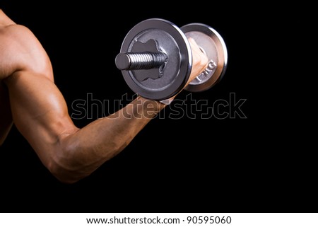 muscular man detail lifting weights on black background