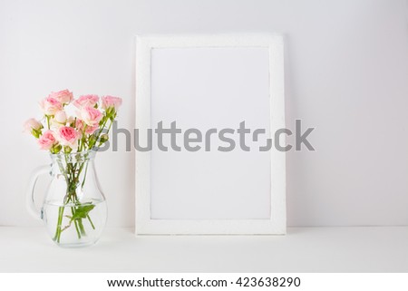 Frame mockup with pink roses. Frame mockup. White frame mockup. Poster Mockup. Styled mockup. Product mockup.  Design Mockup. Empty frame mockup. Portrait frame mockup.