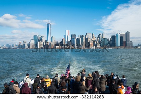 NEW YORK - December 08: Cruise yacht with Manhattan skyline with the group of people on December 08, 2013.