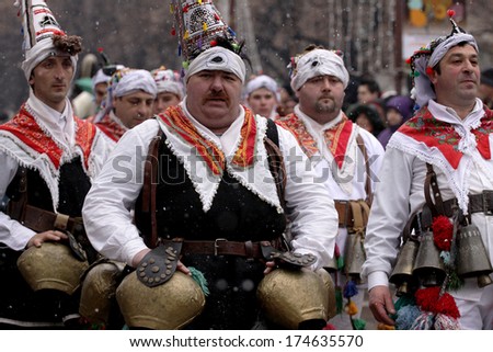 PERNIK, BULGARIA - JAN 25, 2014: Traditional Kukeri costume are seen at the the International Festival of the Masquerade Games Surva in Pernik, Bulgaria. Photo taken on: January 25th, 2014