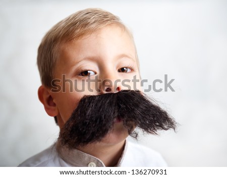 The little boy with a big mustache