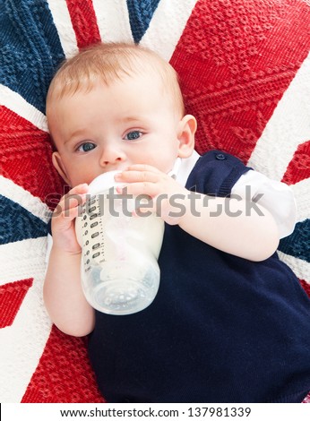 Little Kid with a bottle in hand