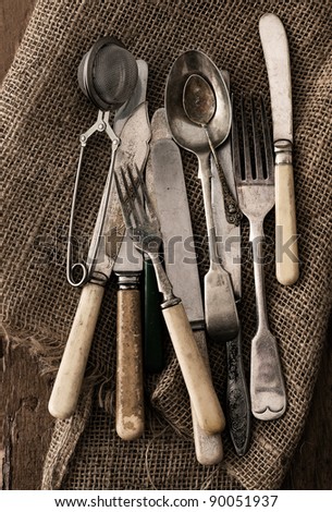 Old cutlery against sacking