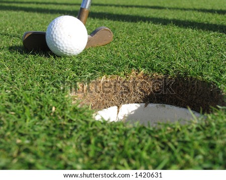Putting a ball in the hole