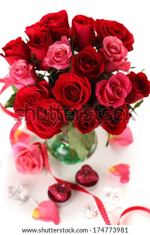 bouquet of red roses in vase on the white background