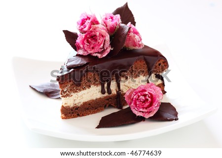 piece of chocolate cake on white isolated background