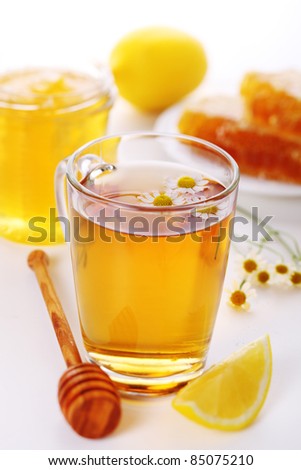 cup of herbal tea with chamomile and lemon