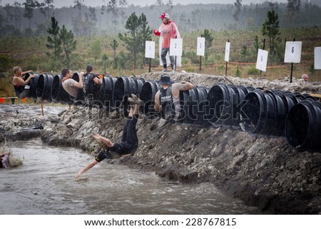 SUNSHINE COAST, QUEENSLAND, AUSTRALIA-16th AUGUST 2014:-Tough Mudder event Queensland.August 2014 in Australia. Tough Mudder is a gruelling challenge event where to finish is to be a winner