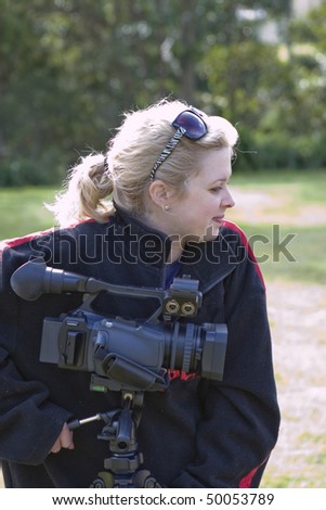 female movie makers, filming a project outdoors