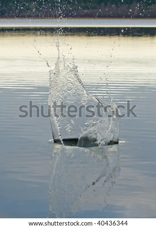 Splash on water from the thrown stone