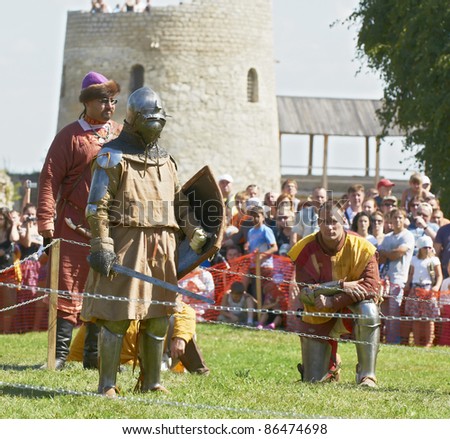 IZBORSK, RUSSIA - AUGUST 6: Unidentified man in a knightly armor take part in festival 