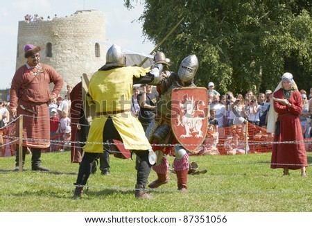 IZBORSK, RUSSIA - AUGUST 6: Unidentified men in a knightly armor take part in festival \