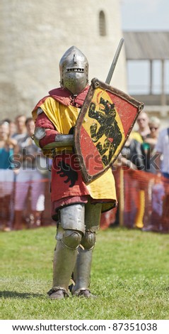 IZBORSK, RUSSIA - AUGUST 6: Unidentified man in a knightly armor takes part in festival \