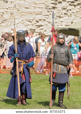 IZBORSK, RUSSIA - AUGUST 6: Unidentified man in a knightly armor take part in festival \