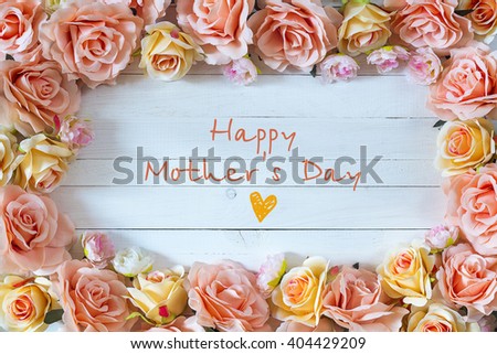 Mothers day background with rose flowers. Mothers Day message with beautiful pink and peach roses. Happy mother's day concept.