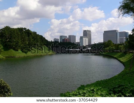 Moat of the Imperial Palace, Tokyo Japan, with skyscrapers in the business district in the background