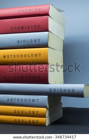 Simple science books and branches abstract in portrait and side-view