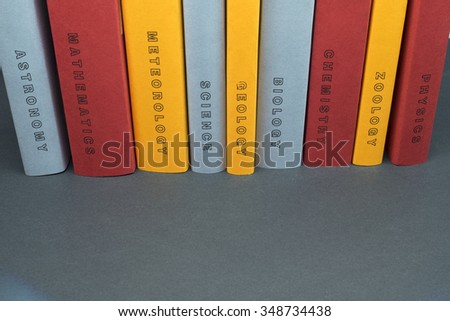 Simple science books and branches abstract in landscape and top-view