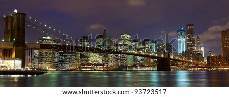 New York City Manhattan and Brooklyn Bridge at dusk
