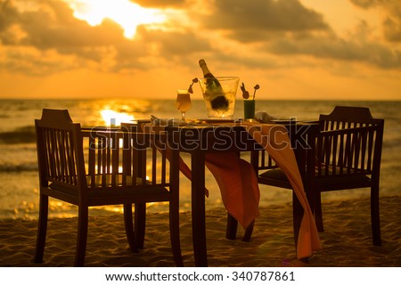 Dinner on the beach on sunset time