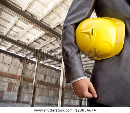 engineer yellow helmet for workers security in the interior of w