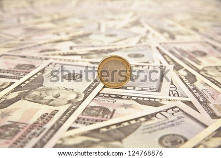 euro coins and us dollar banknote background. Finance concept confrontation between the dollar and euro.