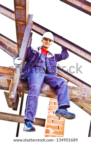 worker on a steel beam raises his hands sitting on the metal structure metal beam - roof frame, Under construction isolated on white background