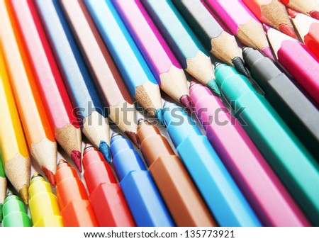 bunch of colored pencils colorful art  background Center symbol of vector business team one goal, one aspiration and desire  bunch of colored pencils isolated on white background