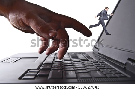 man in suit is diving into laptop screen  symbol of help protectorate support protege