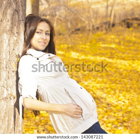 Outdoors portrait of colorful clothed gorgeous fall fashion latin hispanic girl. Copyspace Space for inscription