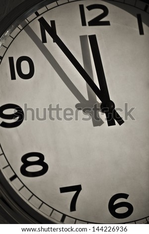 very nice shot of a clock showing 12 or 24 O\'clock  Time is Money