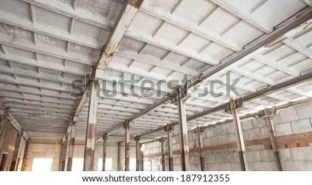 Background of new concrete roof and rusty metal beam industrial hall with windows factory in perspective