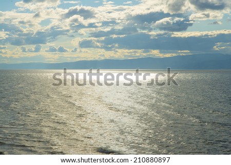 Background of Sea landscape with bad weather and the evening cloudy sky. Russia lake Baikal