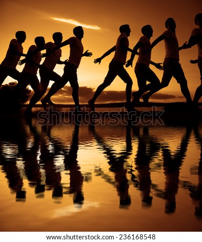 Background of Same man movement Phases Group of people silhouette on jetty over sunset and dramatic yellow orange sky with clouds against water texture and mountain background Sport lifestyle