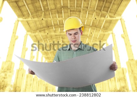Portrait of builder man wear stripped shirt view of architect looking comparing housing project with building blue print paper plan on texture roof background in perspective Copy space for inscription