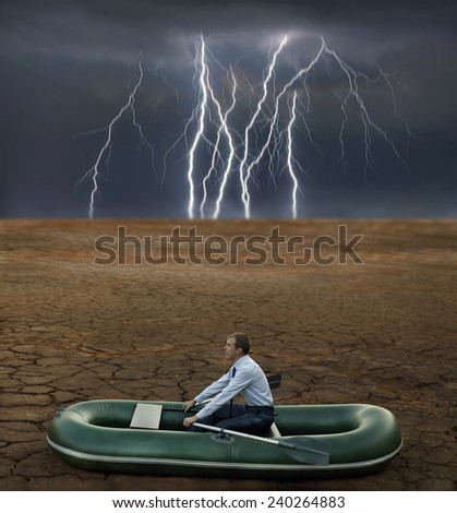 man will rows home for shore in paddle powered row boat businessman in boat rocks looks bright future symbol crisis stagnation losses braking difficulties environmental disaster water scarcity drought