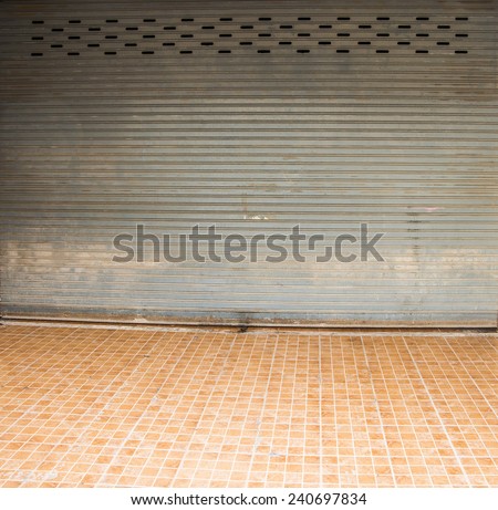 Background of Grunge room with yellow gray corrugated steel wall orange old floor tile - abstract industry background with container texture backdrop Empty space for inscription or people full length