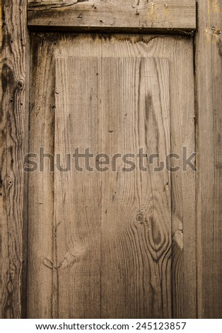 Background of natural material of Old retro vintage aged natural wooden board door texture shabby backdrop close up Dramatic light on surface
