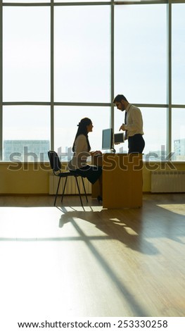 Young couple businessman on table solve theirs problem Handsome asian business man show new options capability on tablet computer women sit at board in office room space type print text loot at screen
