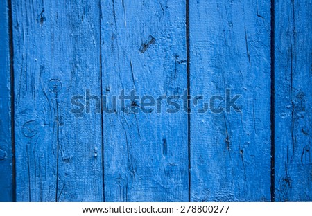 natural material background of old retro vintage aged wood texture with a shabby blue paint front backdrop