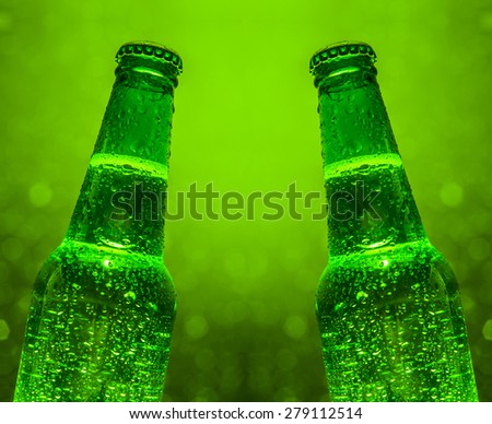 green drink background of two bottle. disco bokeh light backdrop. Empty space for inscription