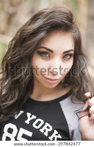 close up summer portrait of asian woman Female outdoor stand against trees background