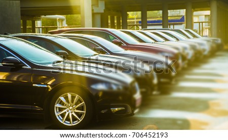 luxury modern Cars For Sale Stock Lot Row. Car Dealer Inventory. Cars For Sale Stock Lot Row. Car Dealer Inventory. sunset sun rays light. sun beam