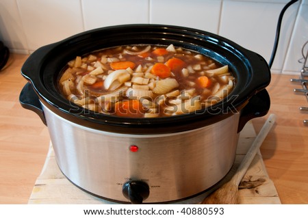 Slow cooker cooking Scouse with the lid off showing the stew cooking, cheep winter cooking
