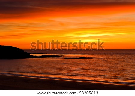 Warm evening glow on beach with copy space.