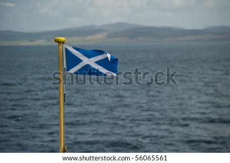 Scotish flag on flag pole with copy space.