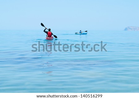 Kayak. People kayaking in the ocean. Active people. Sport and recreation