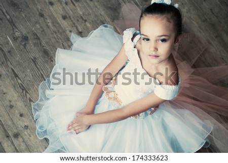 Ballet, ballerina - young and beautiful ballet dancer in tutu in dance studio. Art photo.